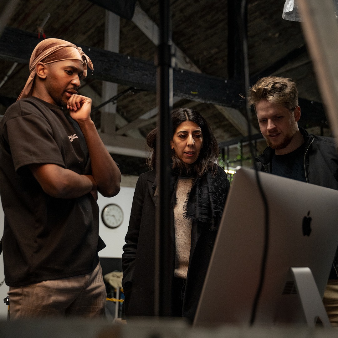 Seventy Nine team reviewing studio work